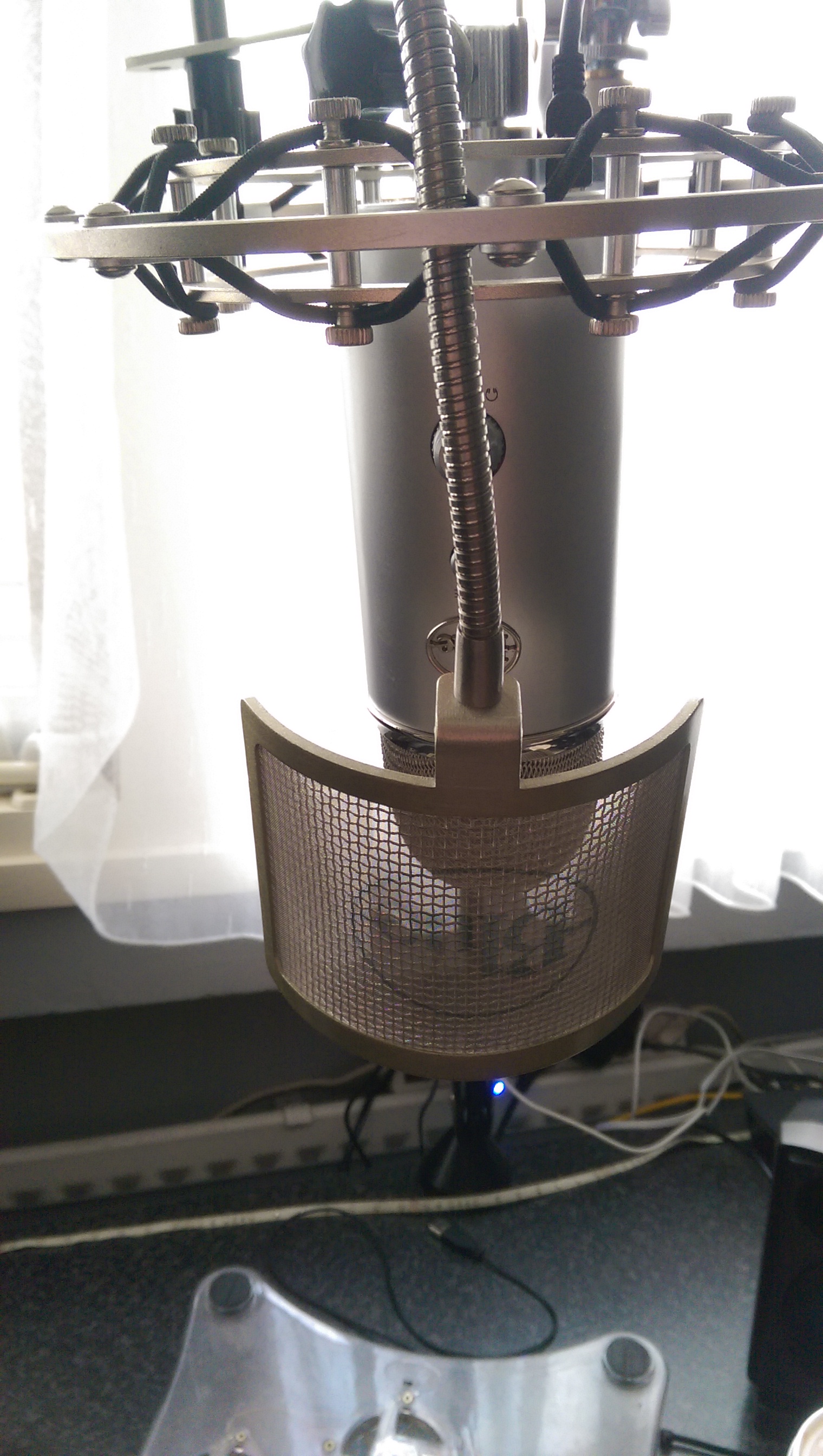 Looking spiffy! picture of the new blue yeti on a mic arm