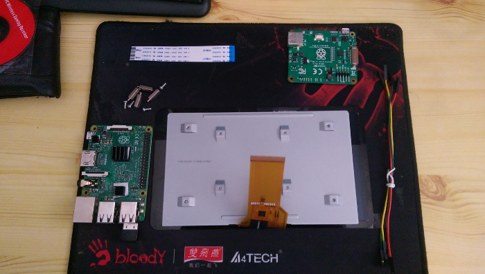 all components inside the box a picture of all the components layed out on a mat